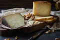 Cheese platter of chopped Spanish hard cheese manchego and sliced Italian pecorino toscano Royalty Free Stock Photo