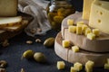Cheese platter of chopped Swedish hard cheese and sliced and Italian pecorino toscano on wooden boards Royalty Free Stock Photo