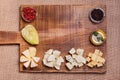 Cheese platter garnished with honey, apple and spice Royalty Free Stock Photo