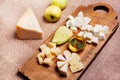 Cheese platter garnished on rustic wooden board Royalty Free Stock Photo