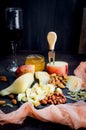 Cheese platter and glass of red wine