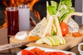 Cheese platter and raki and turkish appetizers next to it Royalty Free Stock Photo