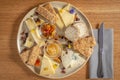 Cheese platter with relish, chutney and crackers Royalty Free Stock Photo