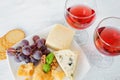 Cheese platter and two glasses of red wine Royalty Free Stock Photo