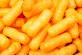 Cheese puff. Cheese puffs snack background texture food pattern. Royalty Free Stock Photo