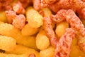 Cheese puffs, Colorful Cheetos Royalty Free Stock Photo