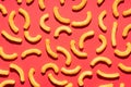 Cheese puffs on red background Royalty Free Stock Photo