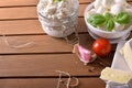 Cheese on rustic wooden table close up