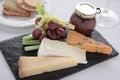 Cheese selection on slate platter Royalty Free Stock Photo