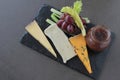 Cheese selection on slate platter Royalty Free Stock Photo