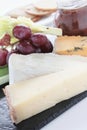 Cheese selection on slate platter Royalty Free Stock Photo