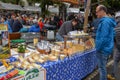 Cheese seller at the autumn market at Engelberg on the Swiss alps
