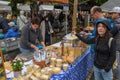 Cheese seller at the autumn market at Engelberg on the Swiss alps