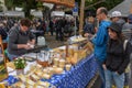 Cheese seller at the autumn market at Engelberg on the Swiss alps