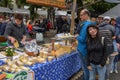 Cheese seller at the autumn market at Engelberg on the Swiss alps