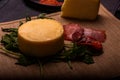 Cheese with serrano ham, olives on a table for a party with friends or as an aperitif Royalty Free Stock Photo