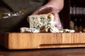 Cheese shop. Roquefort. Selective focus. Close up.