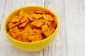 Cheese square crackers in bowl on table Royalty Free Stock Photo