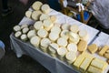 Cheese stall in Central food market of Urubamba, City of the Sacred Valley in Cuzco.