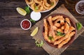 Cheese sticks and onion rings in batter with sauce. Beer snacks. Royalty Free Stock Photo