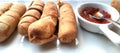 Cheese sticks with pepper sauce - TequeÃÂ±os authentic original Venezuelan appetizer - close u