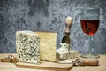 Cheese still life with brie, manchego wedge and French salty blue Royalty Free Stock Photo