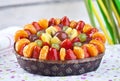 Cheese tart with fruit. on floral background