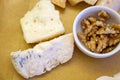 Cheese tasting, piece of italian blue cheeses gorgonzola dolce and picante with blue mold from north of Italy close up