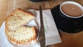 A cheese toastie with a cup of tea Royalty Free Stock Photo