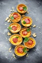 Cheese tomato tartlets , puff pastry appetizers , italian antipasti wine snack Royalty Free Stock Photo