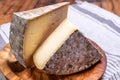 Cheese tomme de montagne or tomme de savoie made from cow milk in French Alps Royalty Free Stock Photo