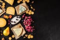 Cheese variety, with fruits and snacks, shot from the top Royalty Free Stock Photo