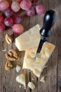 Cheese, walnut, and grapes Royalty Free Stock Photo