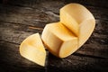 Cheese wheel on wood. Organic food Royalty Free Stock Photo