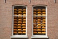 Cheese wheels in a Dutch shop windows Royalty Free Stock Photo