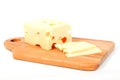 Cheese on wooden kitchen board Royalty Free Stock Photo