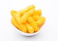 Cheese yellow corn snacks in white bowl Royalty Free Stock Photo