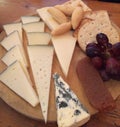 Cheeseboard with biscuits and grapes