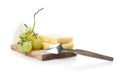 Cheeseboard of hard and blue cheese with grapes