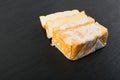 Cheeseboard with Sliced Yellow Cheese Close Up Royalty Free Stock Photo