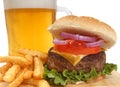 Cheeseburger with french fries and beer Royalty Free Stock Photo