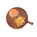 Cheeseburger and French fries on a round wooden board, top view, isolated on white background with clipping path Royalty Free Stock Photo