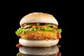 Cheeseburger hamburger isolated on black. BBQ sauce and lettuce. Front view Royalty Free Stock Photo