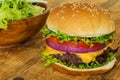 Cheeseburger/Hamburger on rustic wood