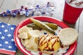 Cheeseburger with ketchup and mustard at a patriotic themed cookout Royalty Free Stock Photo