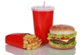 Cheeseburger meal with french fries and cola, isolated Royalty Free Stock Photo