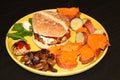 Cheeseburger plate with sweet potatoes Royalty Free Stock Photo