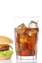 Cheeseburger and soda glass