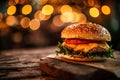 a cheeseburger on a wooden surface