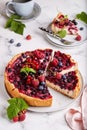 Cheesecake backed with berry mix on the top: cherries, raspberries, blueberries, red currant and blackcurrant Royalty Free Stock Photo